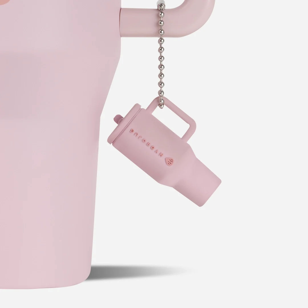 traveler-keychain-w3 Web-TravelerKeychainPhotos-PinkSand2.webp